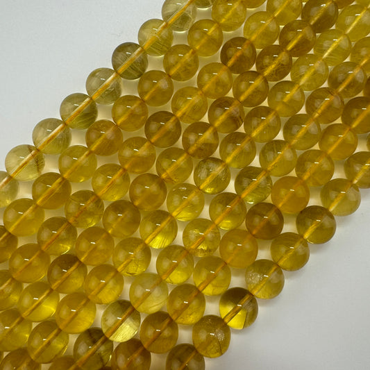 Yellow Fluorite AAA Polished  Round Beads image 0
