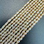 White, Peach and Pink Pearl  4x2mm image 0