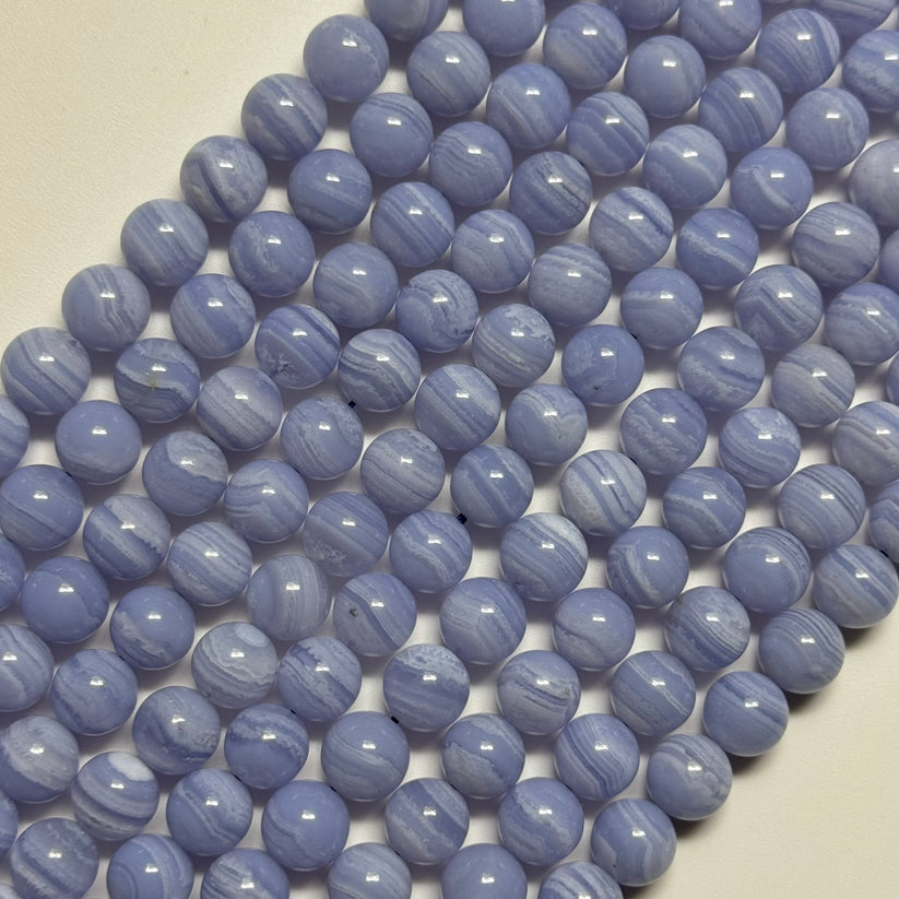 Blue Lace Agate - Delicate bands of soft blue and white creating a peaceful, tranquil pattern perfect for jewelry makin