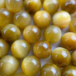 Golden Tiger's Eye Polished Round Beads image 2