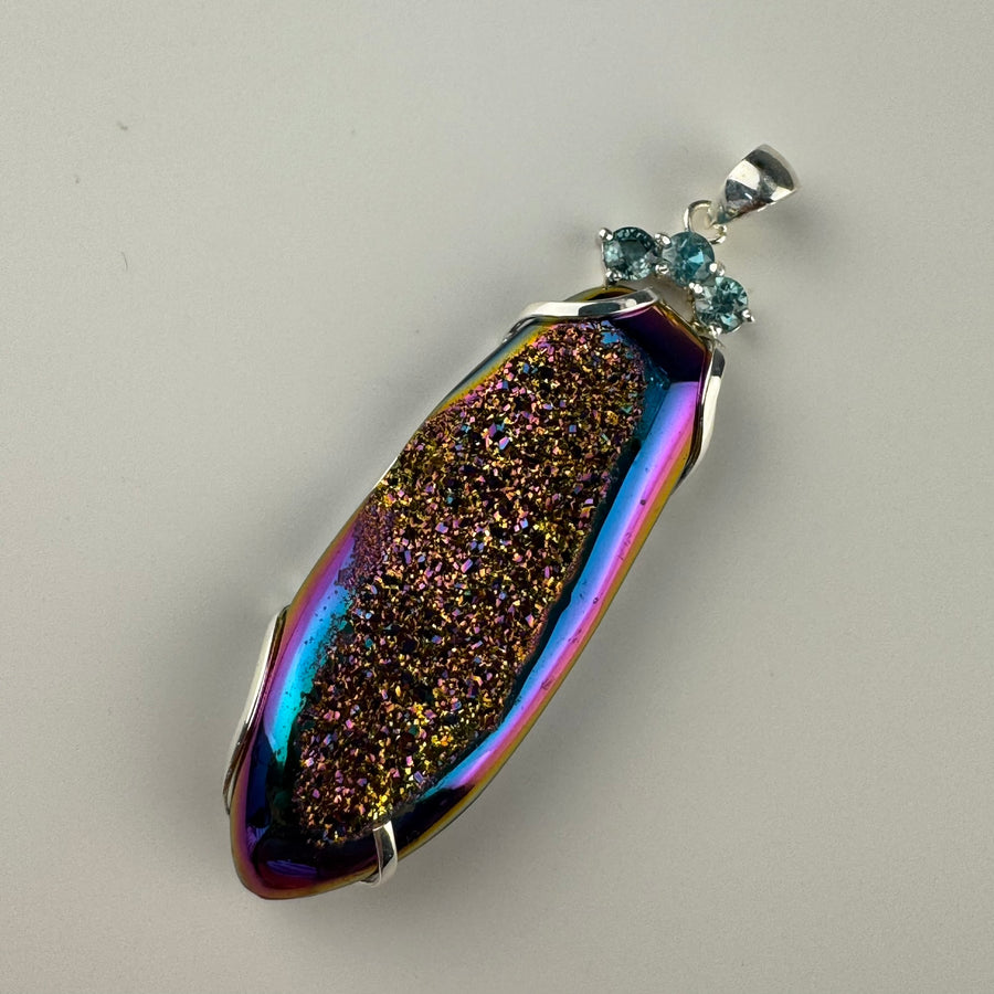 Titanium-Coated Druzy Pendant with Three Blue Zircons image 0