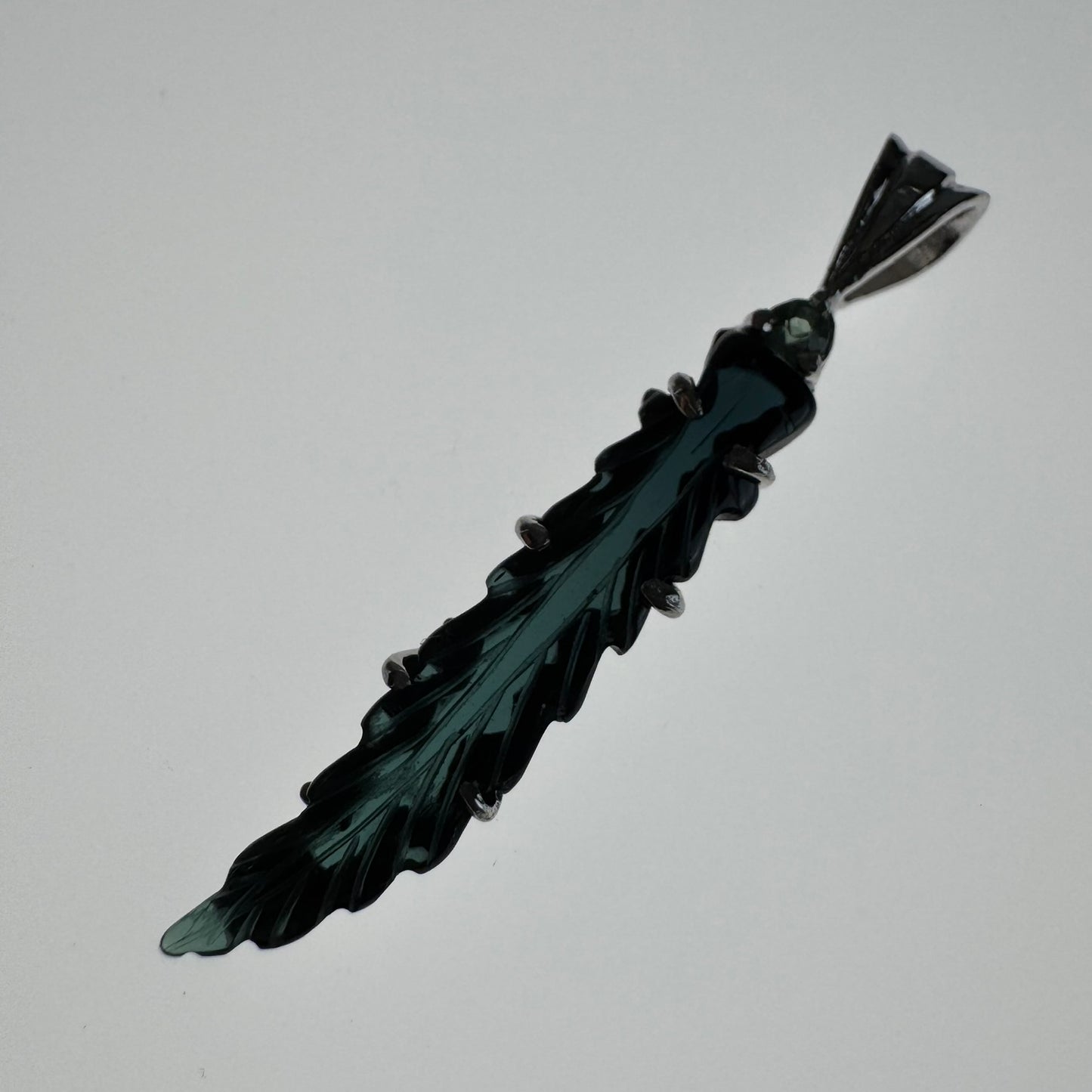 Hand carved blue Tourmaline earring from Brazil, set in sterling silver 925