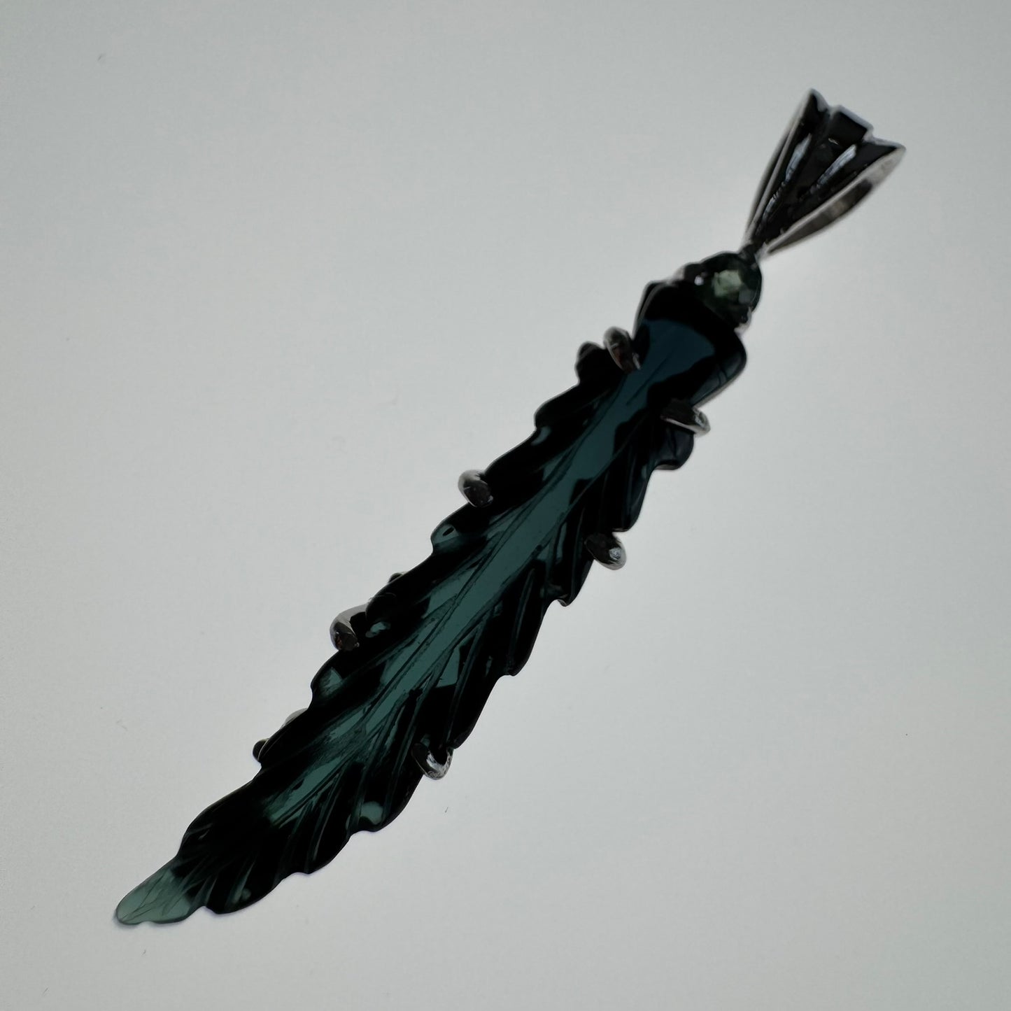 Hand carved blue Tourmaline earring from Brazil, set in sterling silver 925