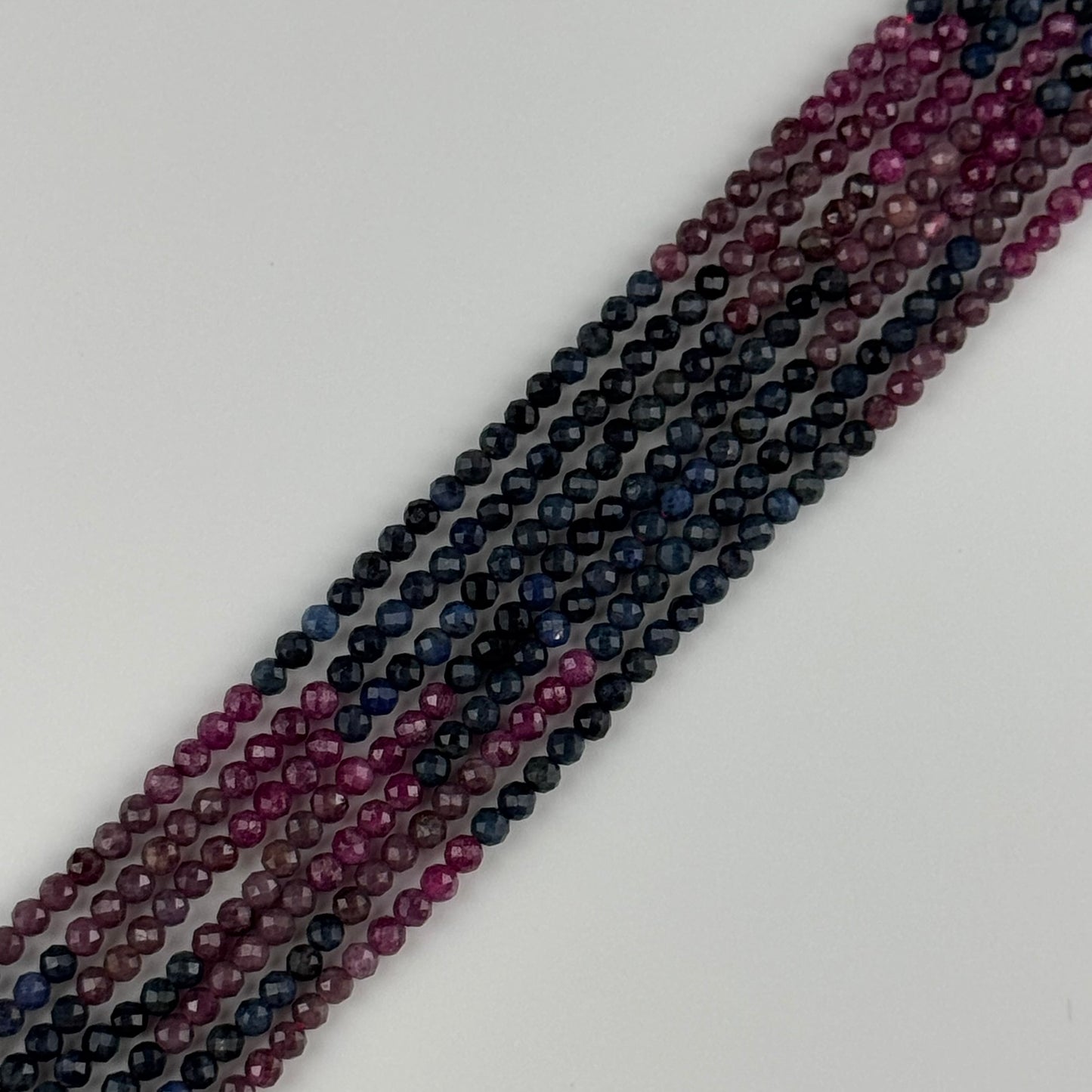 Ruby Glass Filled Sapphire Natural Faceted Round Beads - (AB Quality)