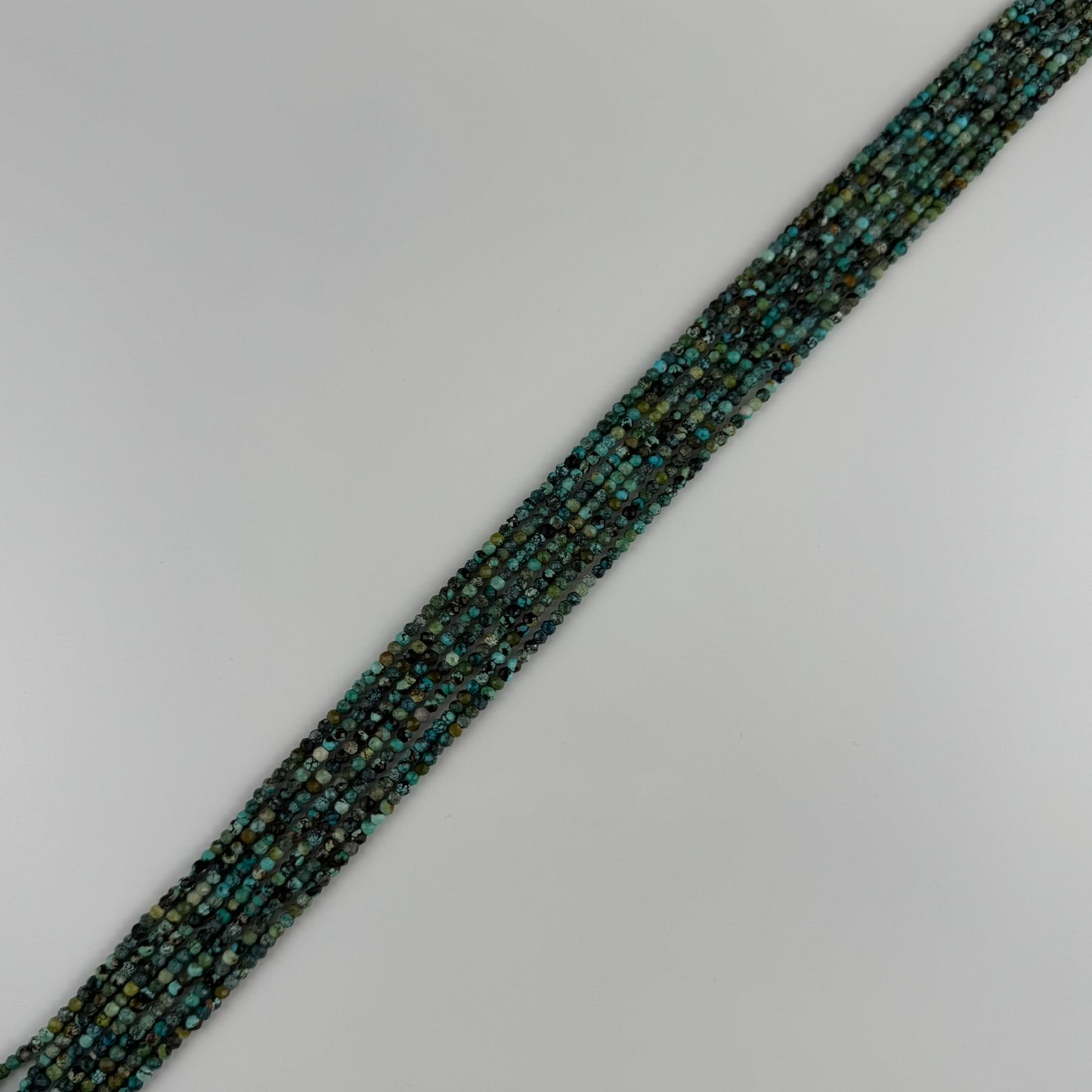 Turquoise Faceted Round Beads - (A Quality)