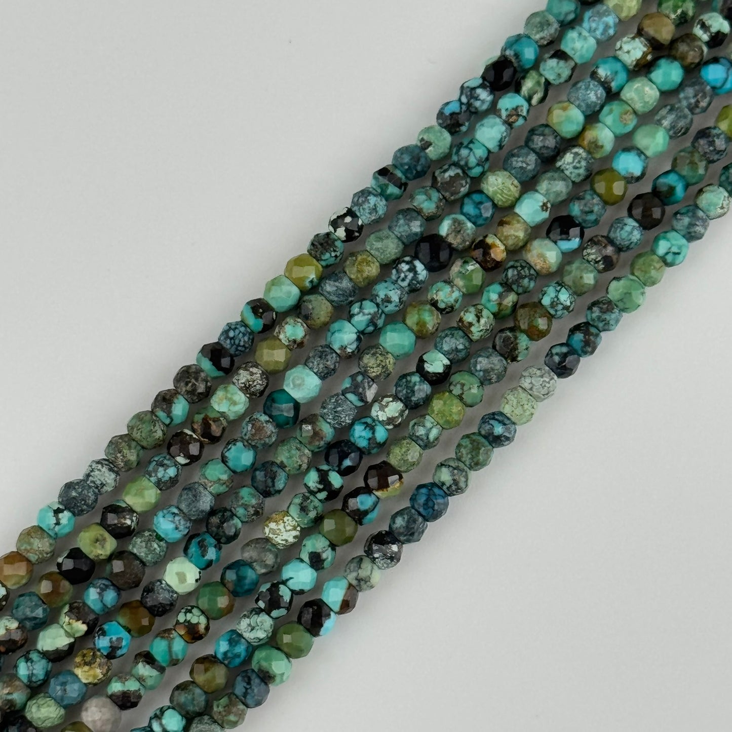 Turquoise Faceted Round Beads - (A Quality)