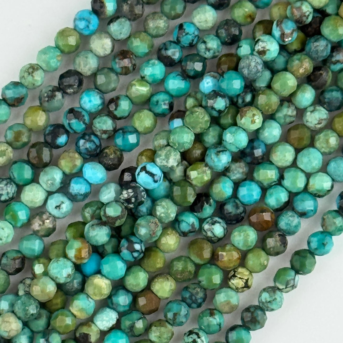 Turquoise Faceted Round Beads - (A Quality)