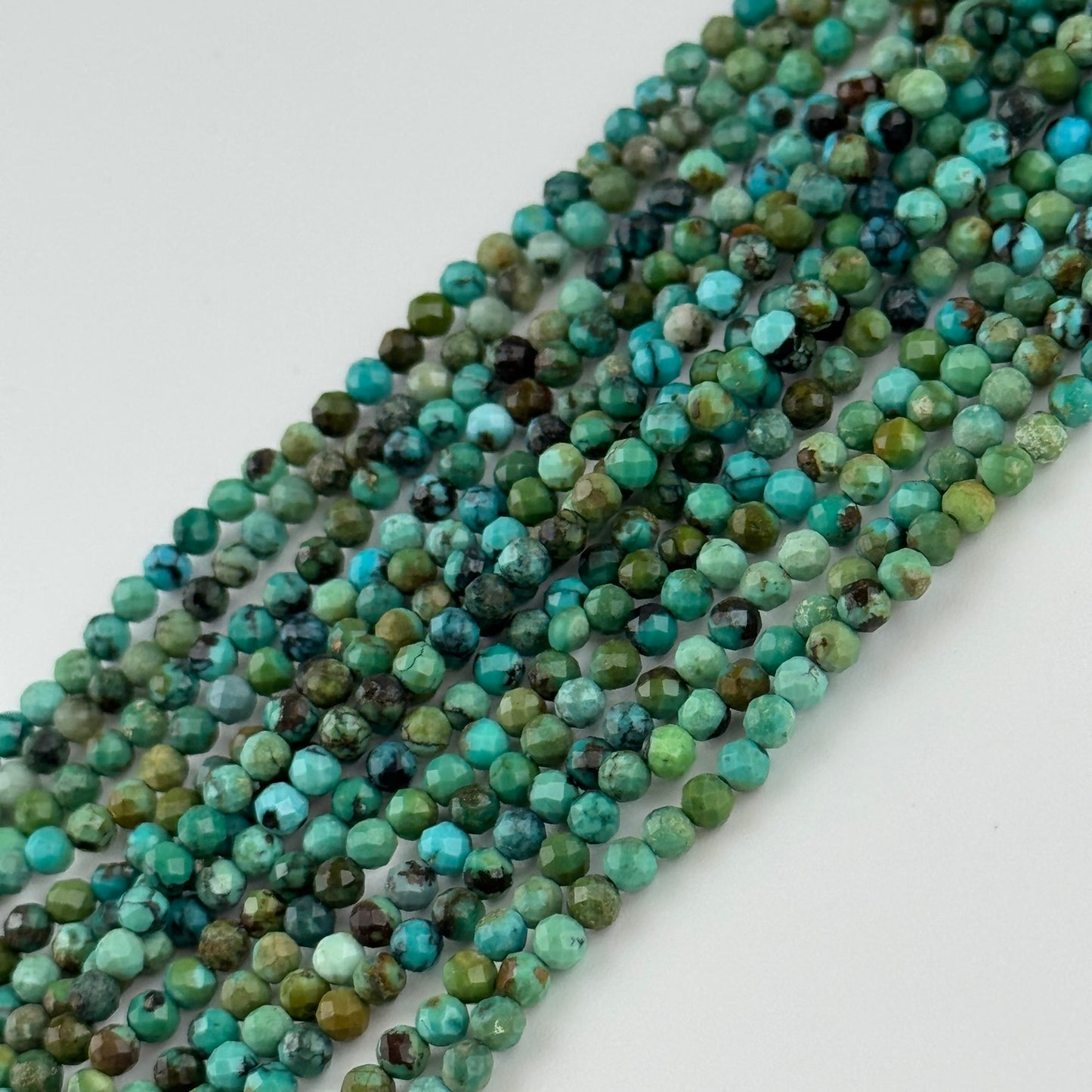 Turquoise Faceted Round Beads - (A Quality)