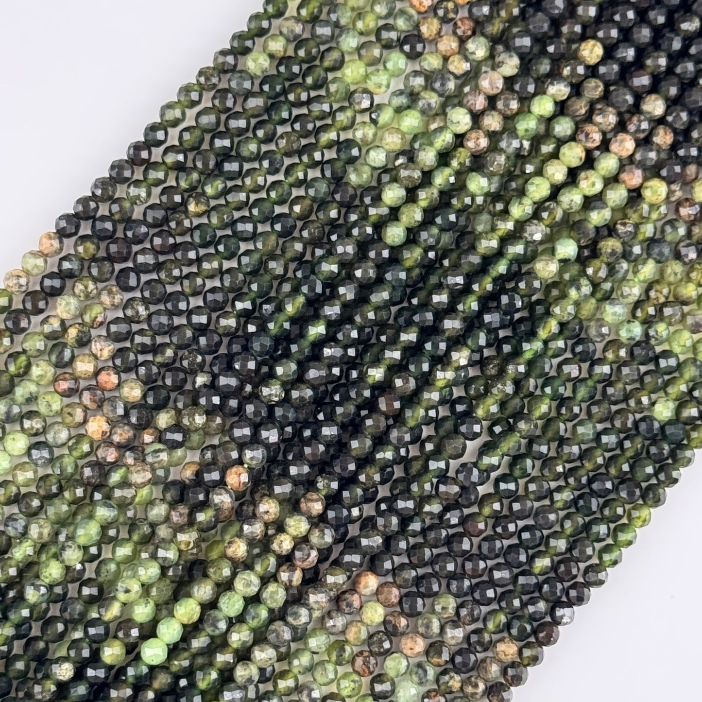 Serpentine Faceted Round Beads - (A Quality)