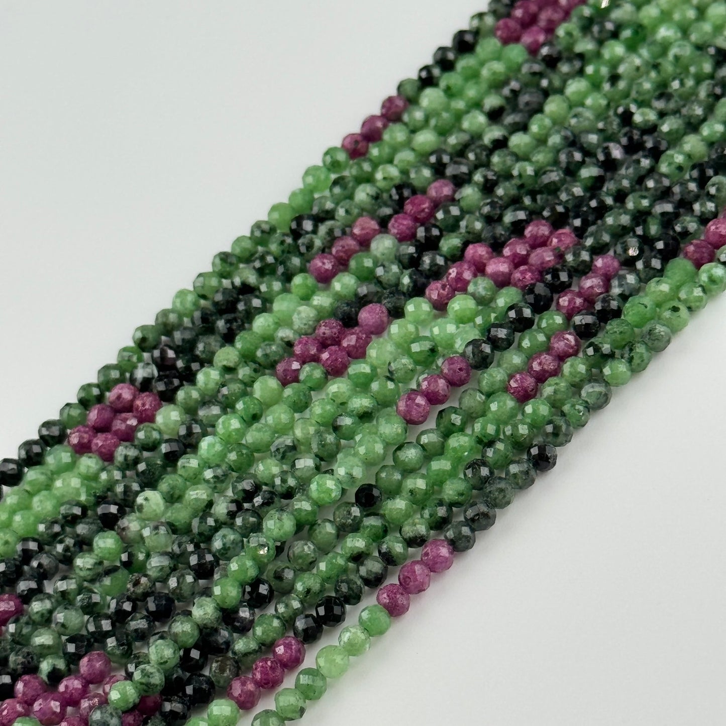 Ruby Zoisite Faceted Round Beads