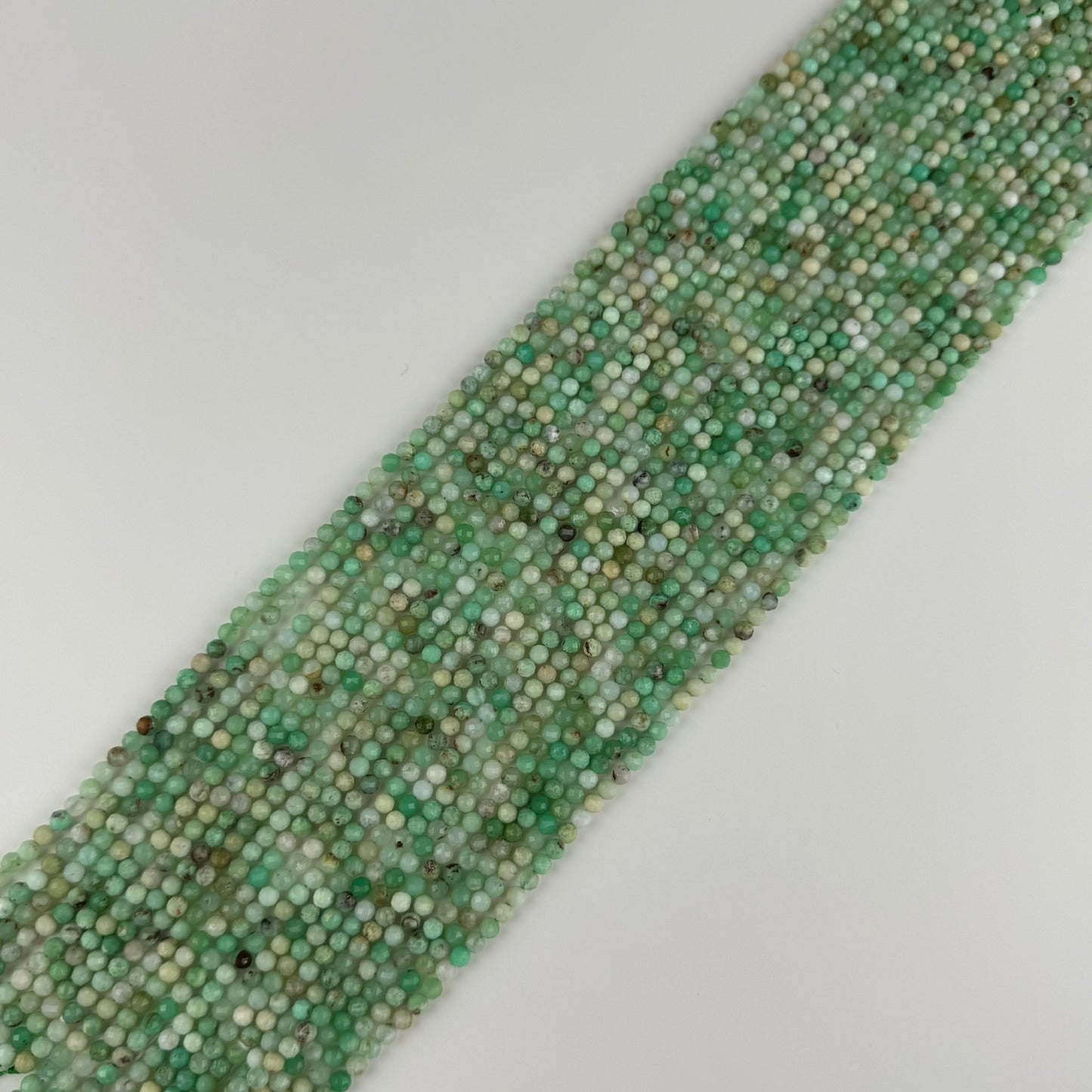 Chrysoprase Faceted Round - (A Quality)