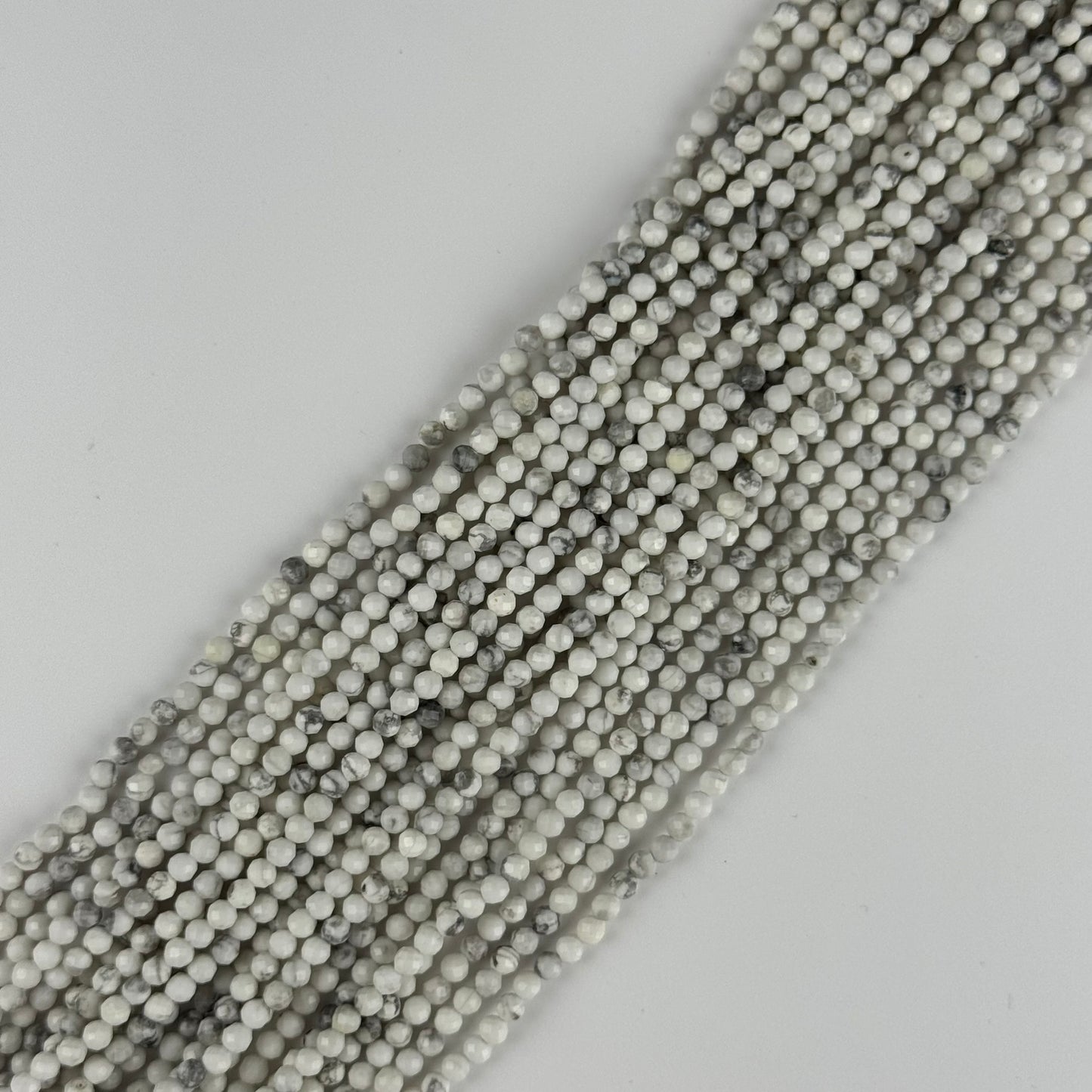 Howlite Faceted Round Beads - (AA Quality)