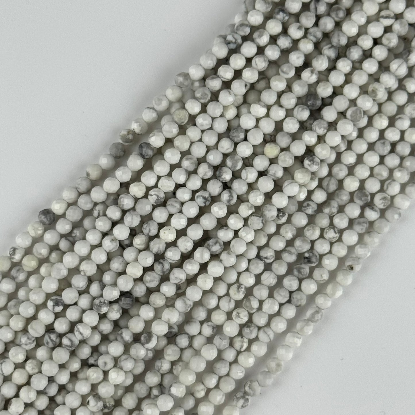 Howlite Faceted Round Beads - (AA Quality)