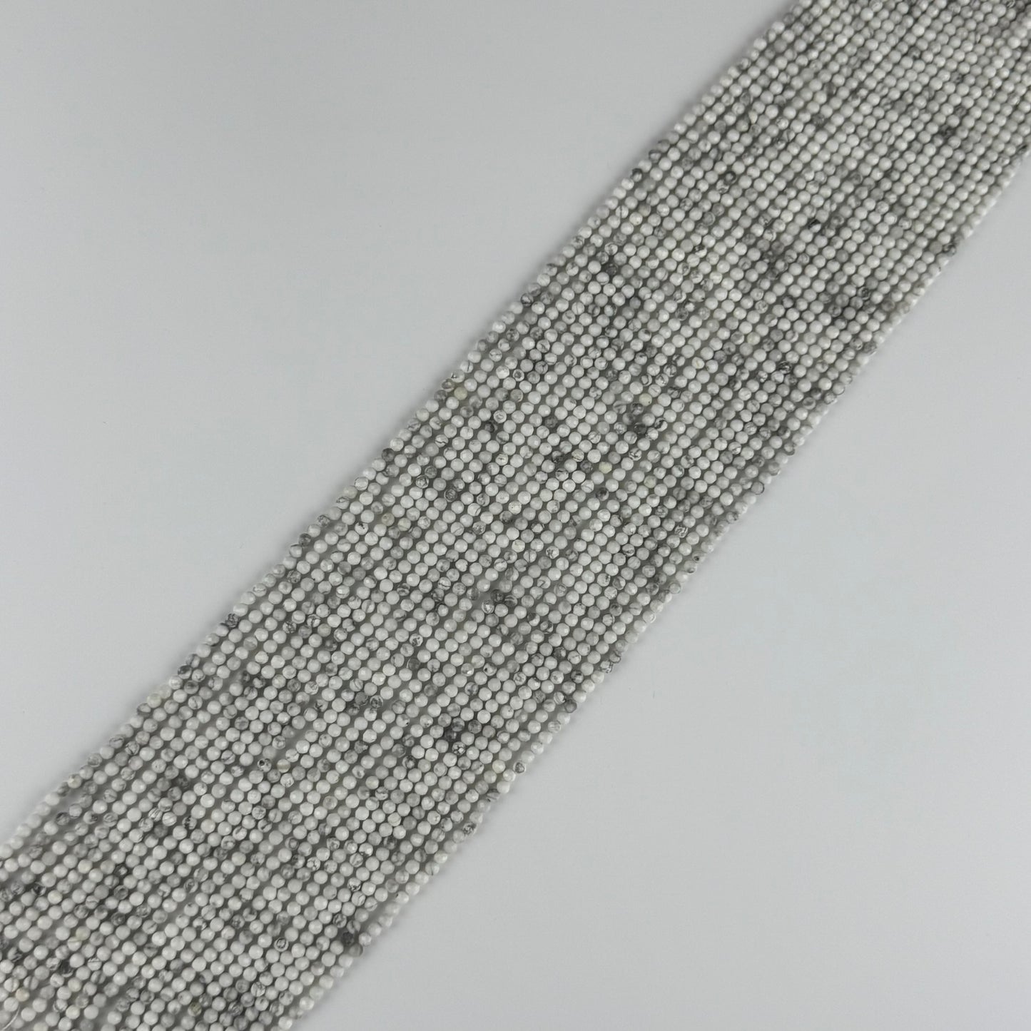 Howlite Faceted Round Beads - (AA Quality)