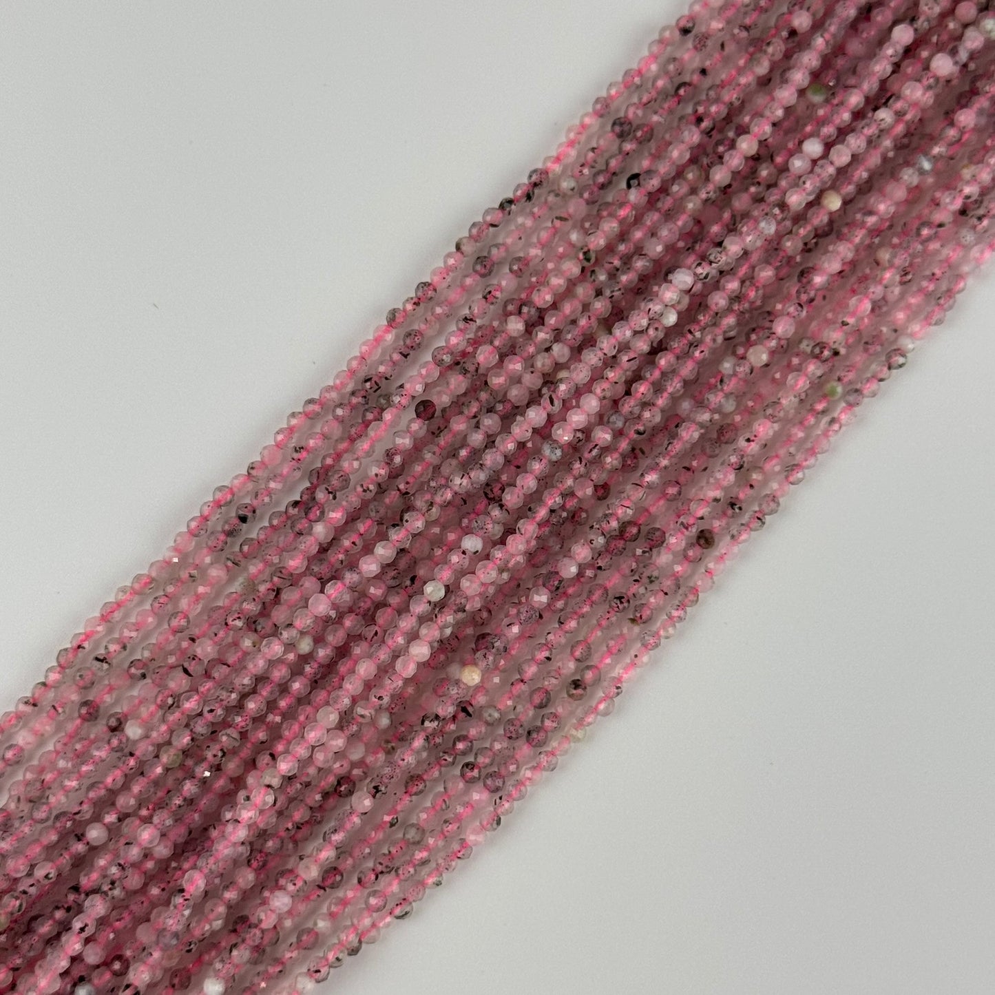 Epidot in Quartz Faceted Round - (AA Quality)