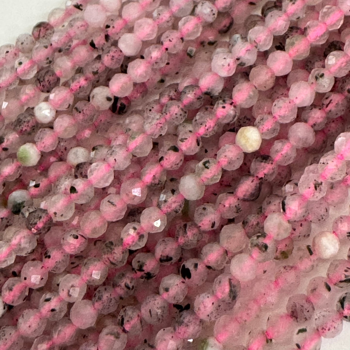 Epidot in Quartz Faceted Round - (AA Quality)