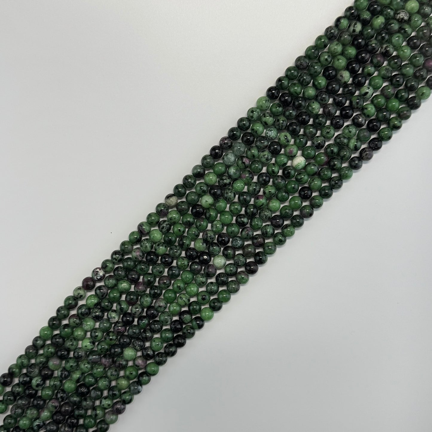 Ruby Zoisite Polished Round Beads - (A Quality)