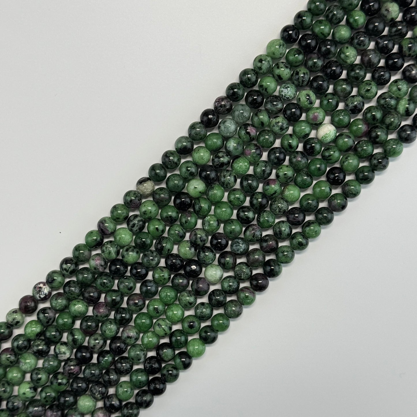 Ruby Zoisite Polished Round Beads - (A Quality)