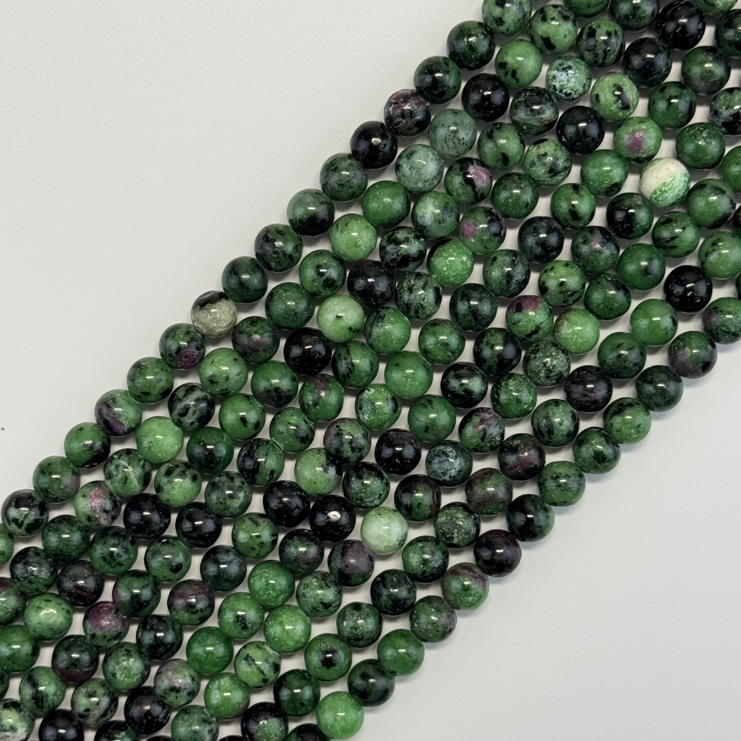 Ruby Zoisite Polished Round Beads - (A Quality)