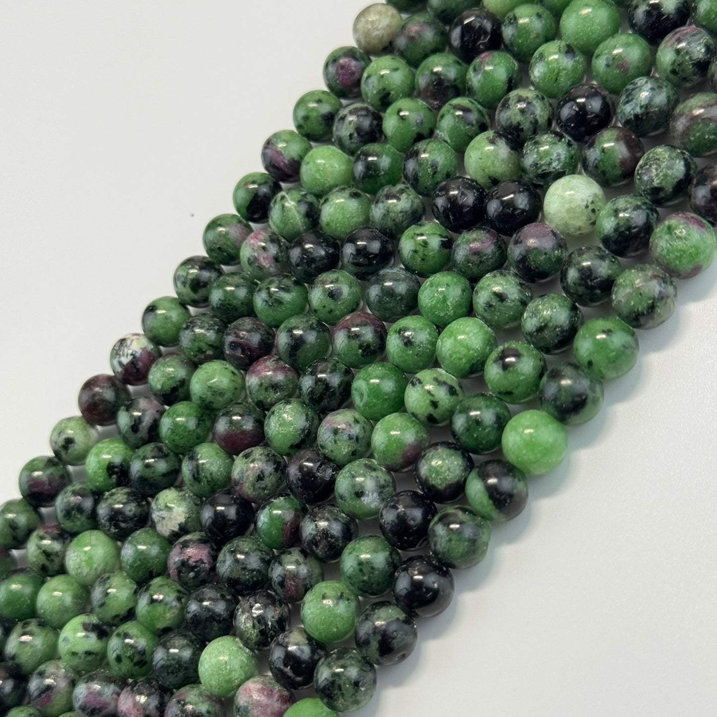 Ruby Zoisite Polished Round Beads - (A Quality)