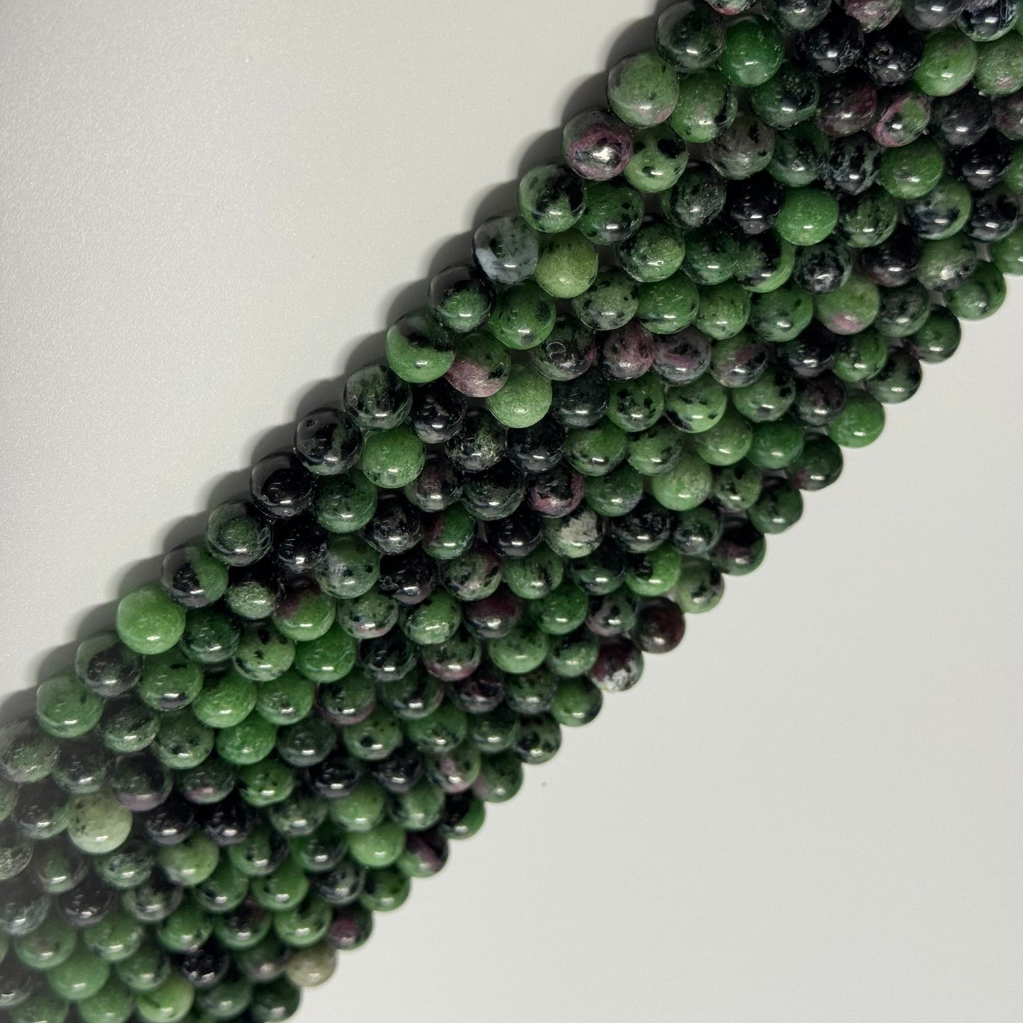 Ruby Zoisite Polished Round Beads - (A Quality)