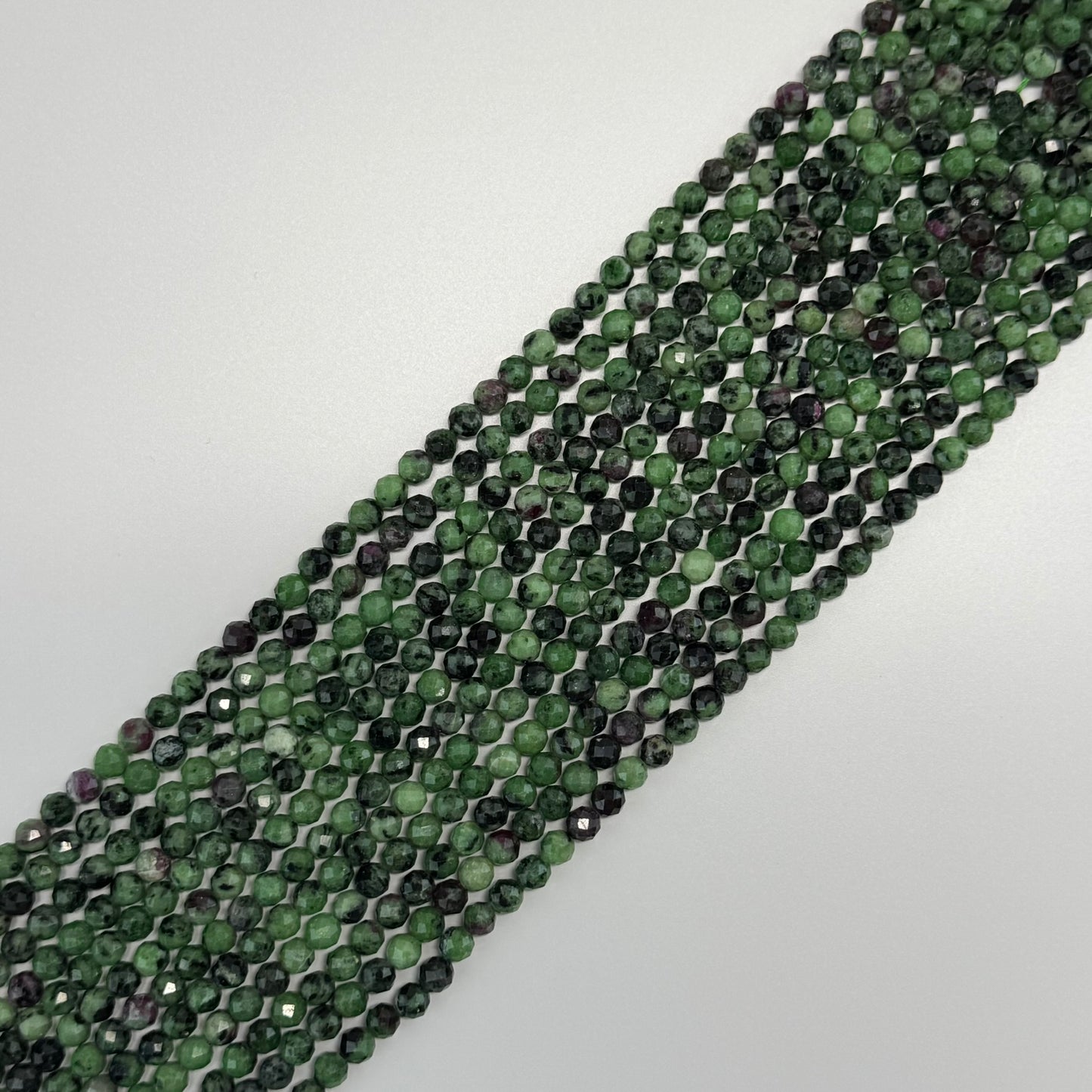 Ruby Zoisite Faceted Round Beads