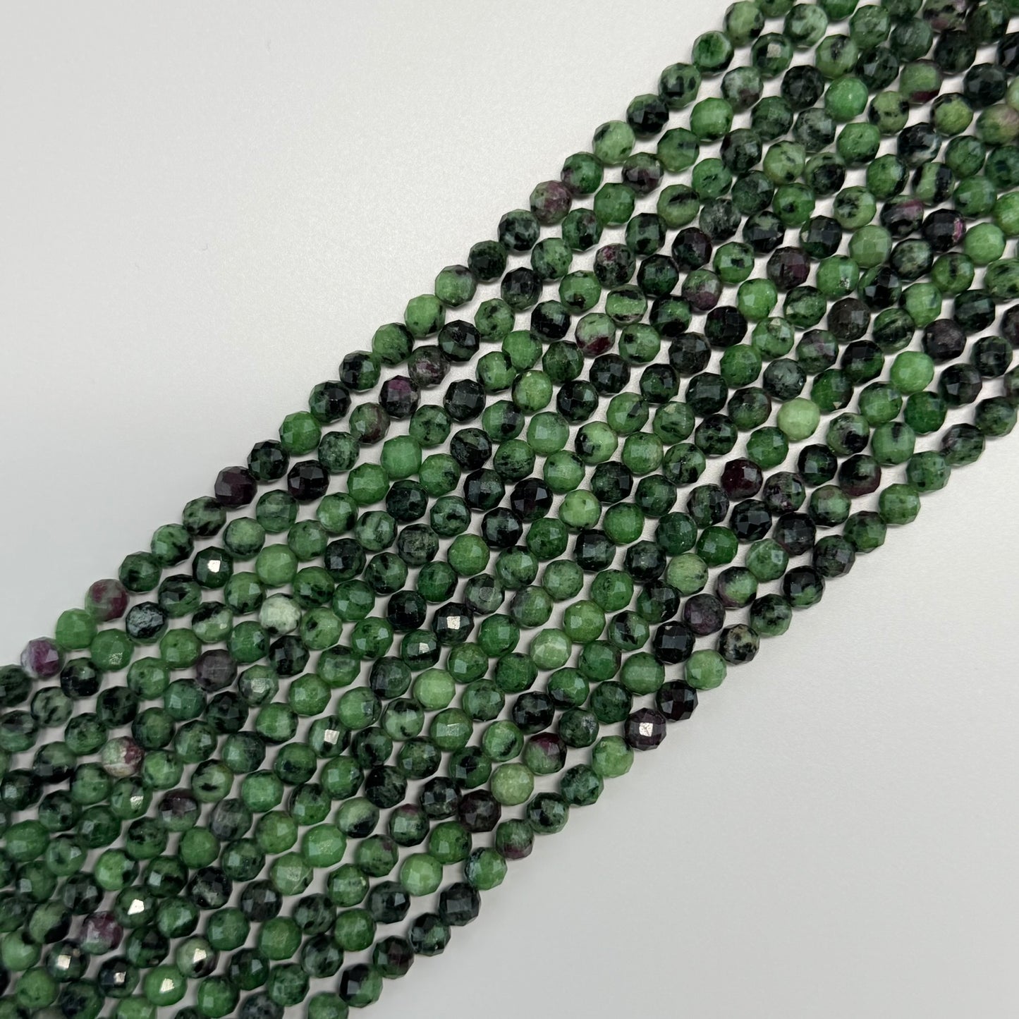 Ruby Zoisite Faceted Round Beads