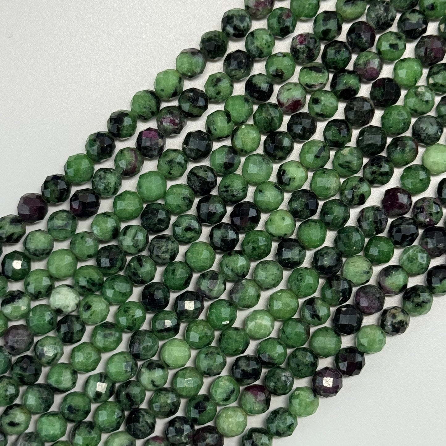 Ruby Zoisite Faceted Round Beads