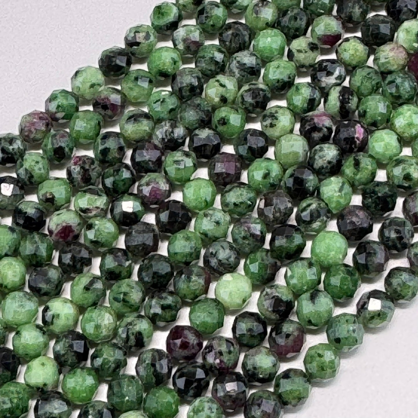 Ruby Zoisite Faceted Round Beads