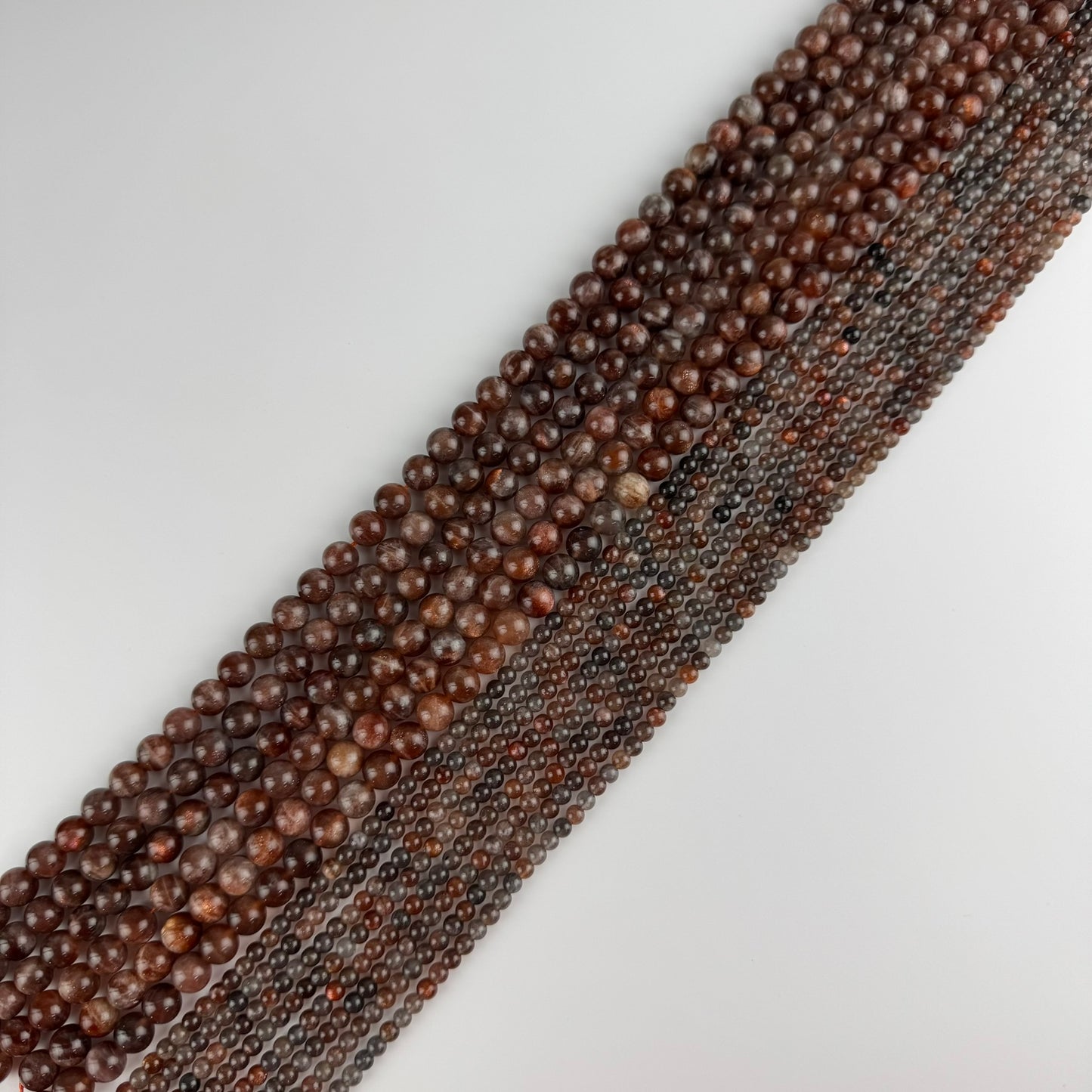 Burgundy Sunstone Polished Round Beads (AAA Quality)