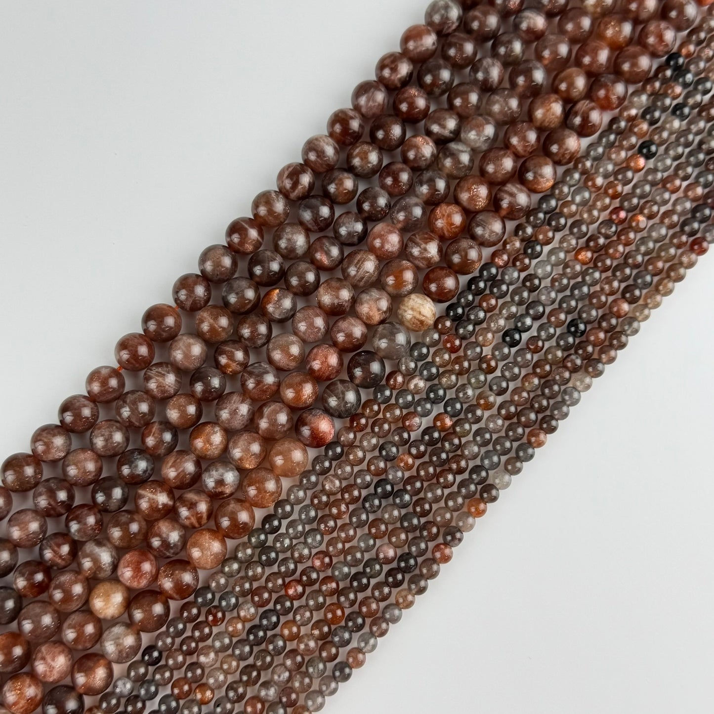 Burgundy Sunstone Polished Round Beads (AAA Quality)