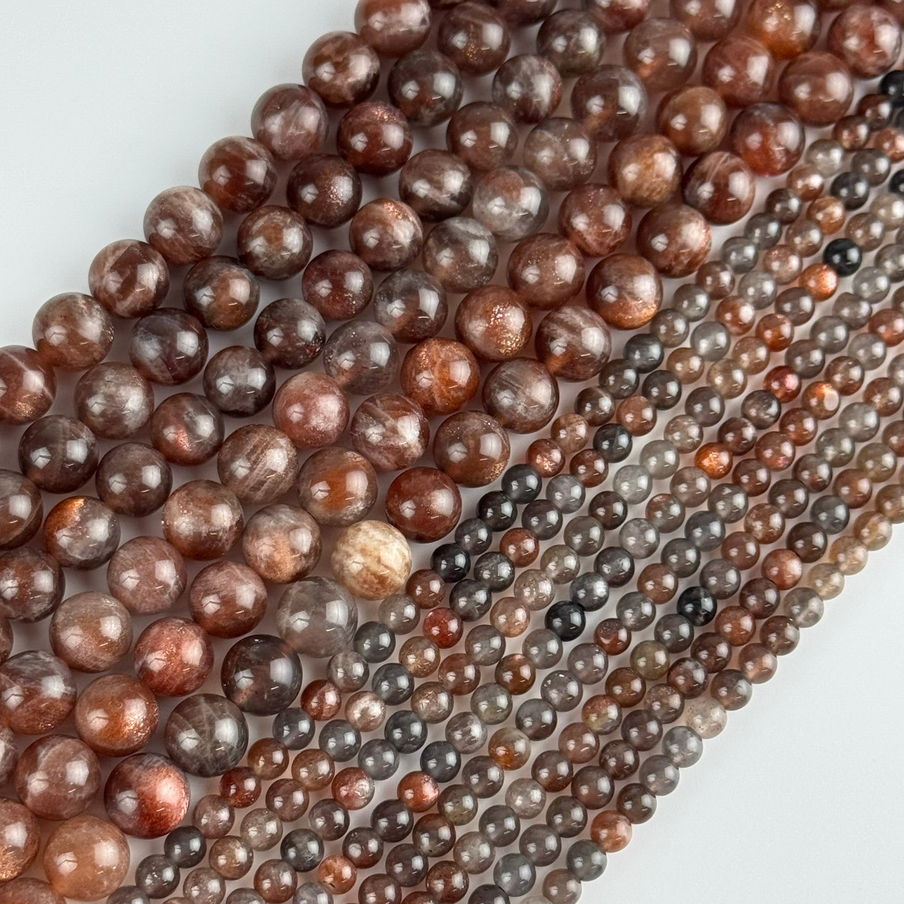Burgundy Sunstone Polished Round Beads (AAA Quality)