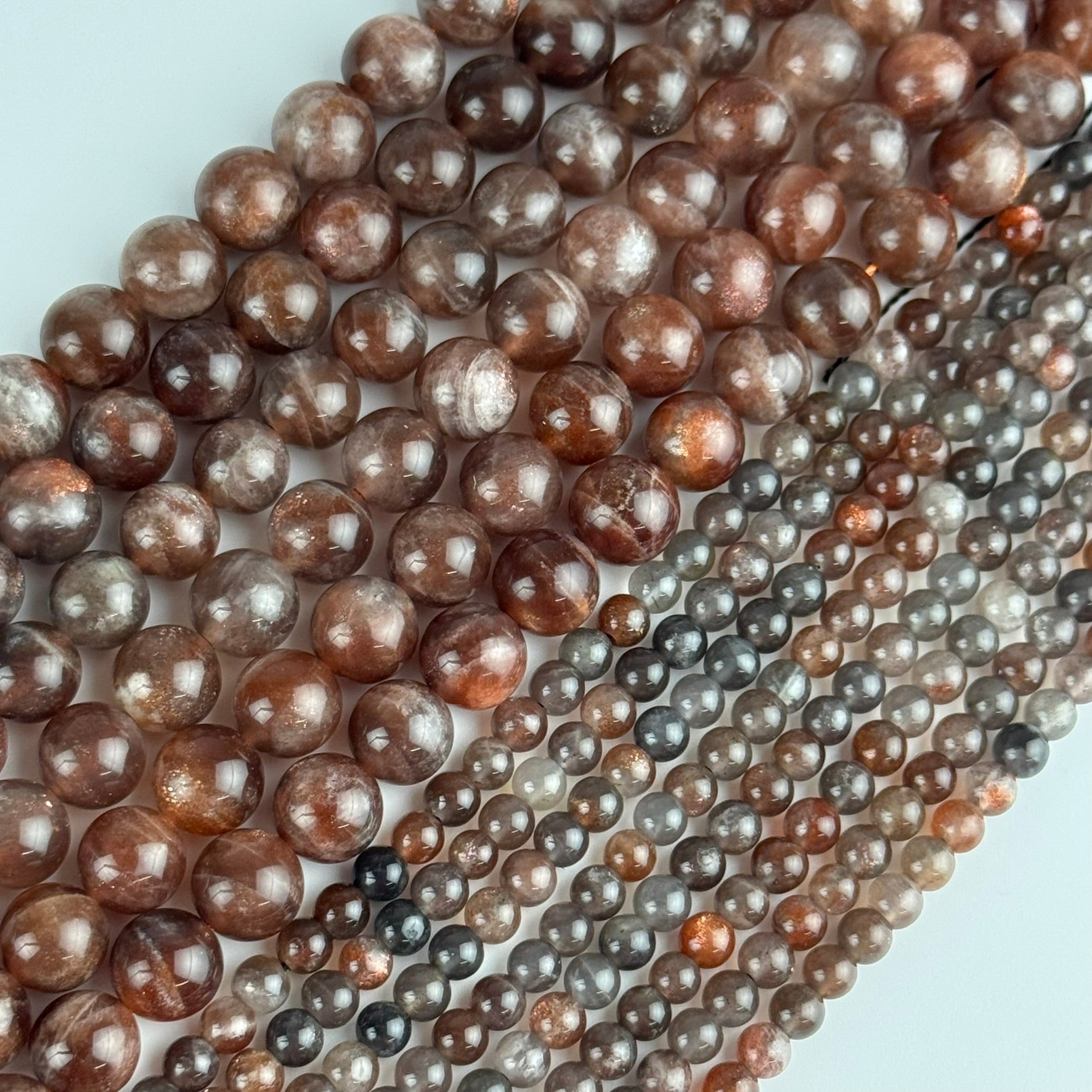 Burgundy Sunstone Polished Round Beads (AAA Quality)