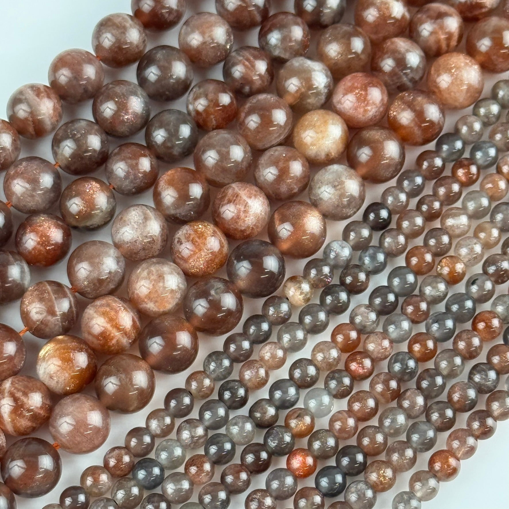 Burgundy Sunstone Polished Round Beads (AAA Quality)