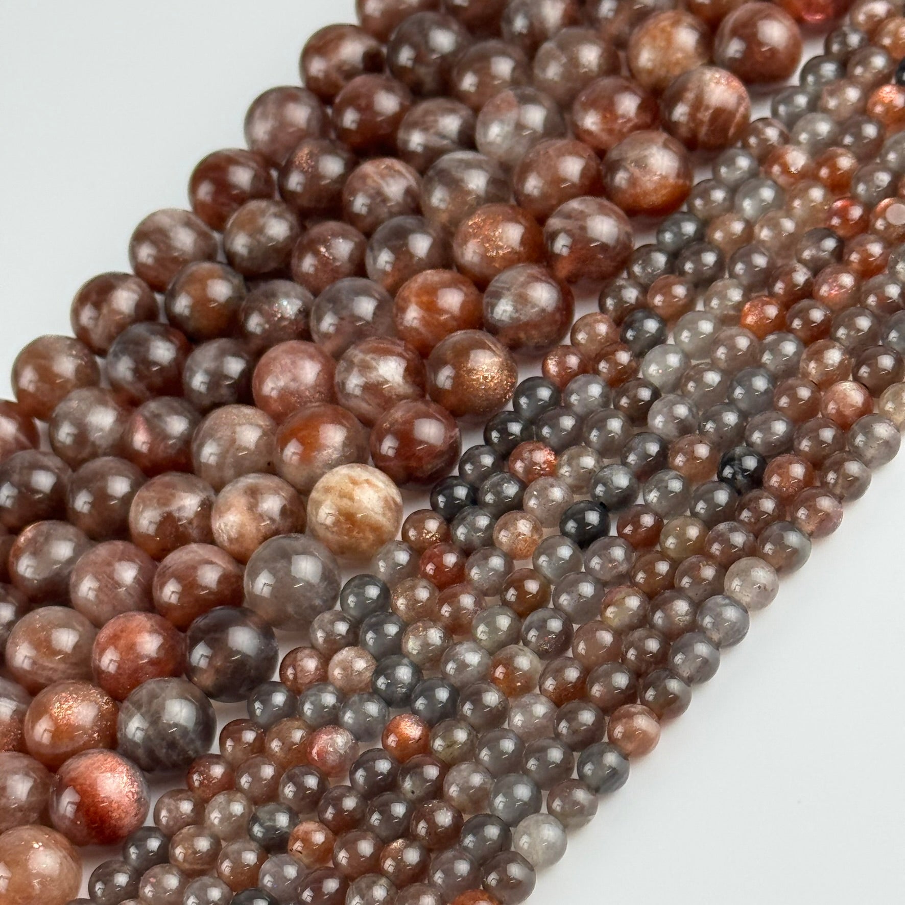 Burgundy Sunstone Polished Round Beads (AAA Quality)