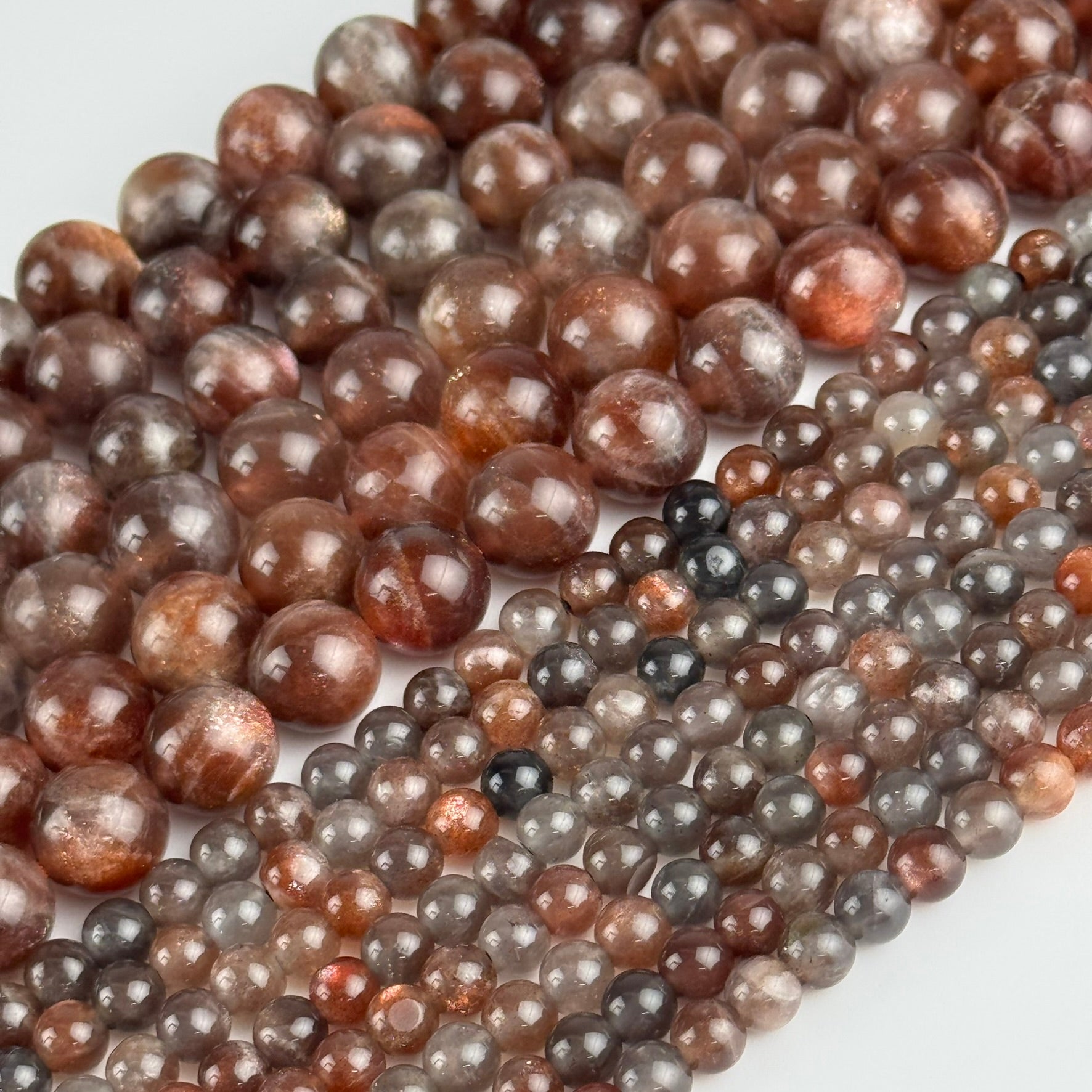Burgundy Sunstone Polished Round Beads (AAA Quality)