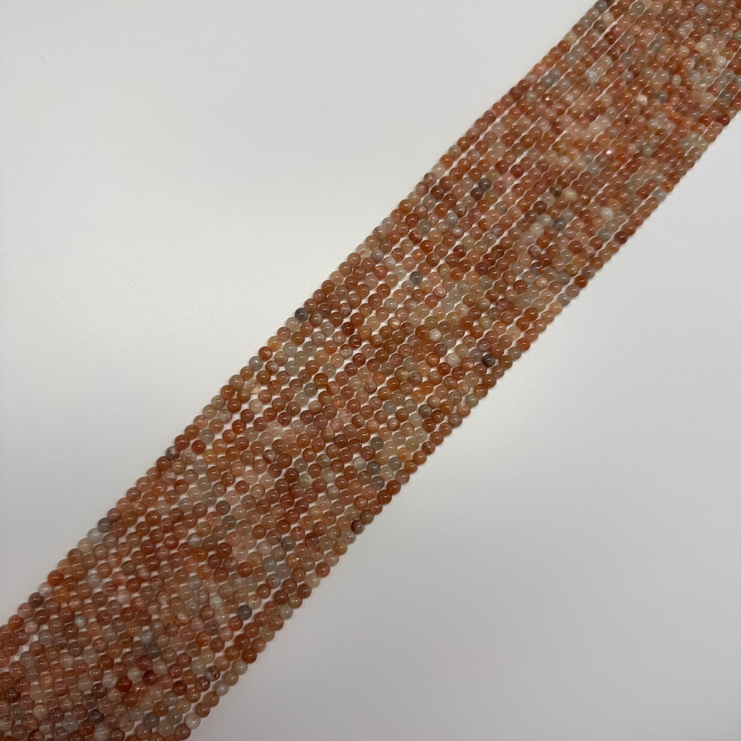 Sunstone Polished Round Beads