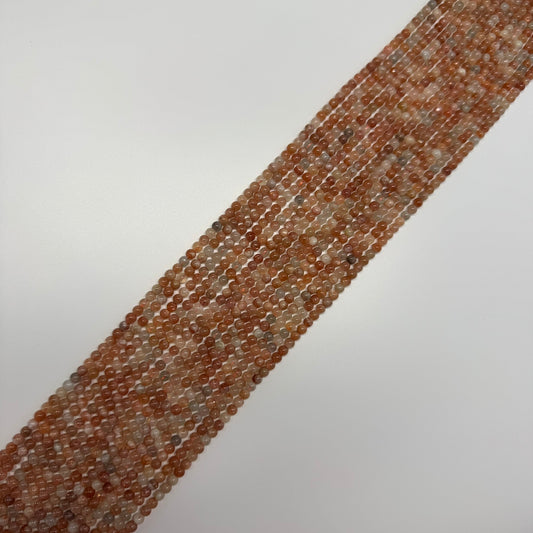 Sunstone Polished Round Beads