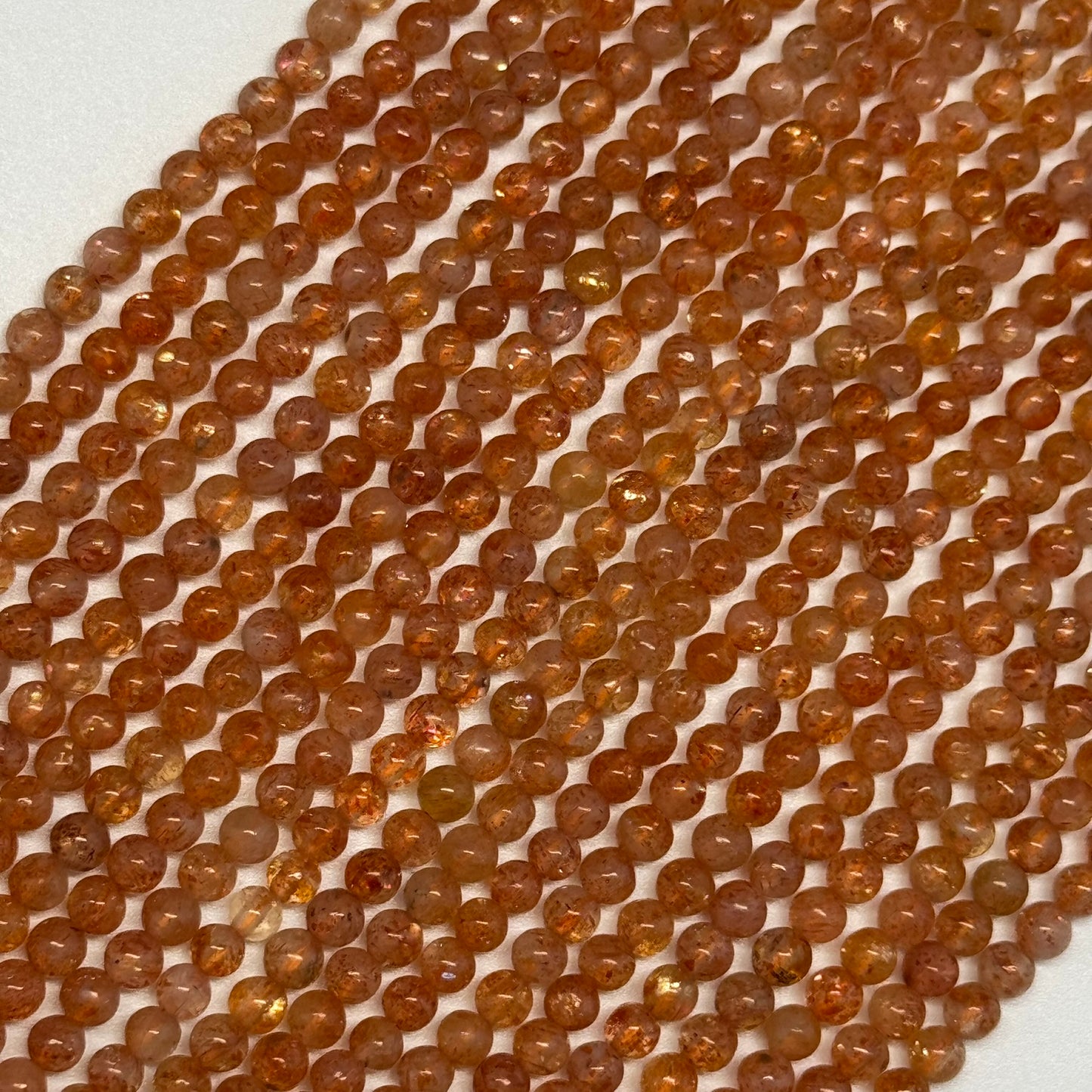 Sunstone Polished Round Beads