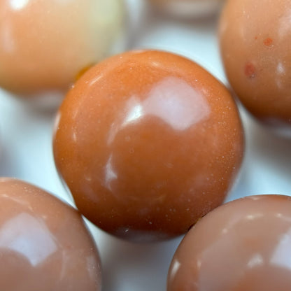 Jasper Orange Fancy Polished Round Beads (AA Quality)