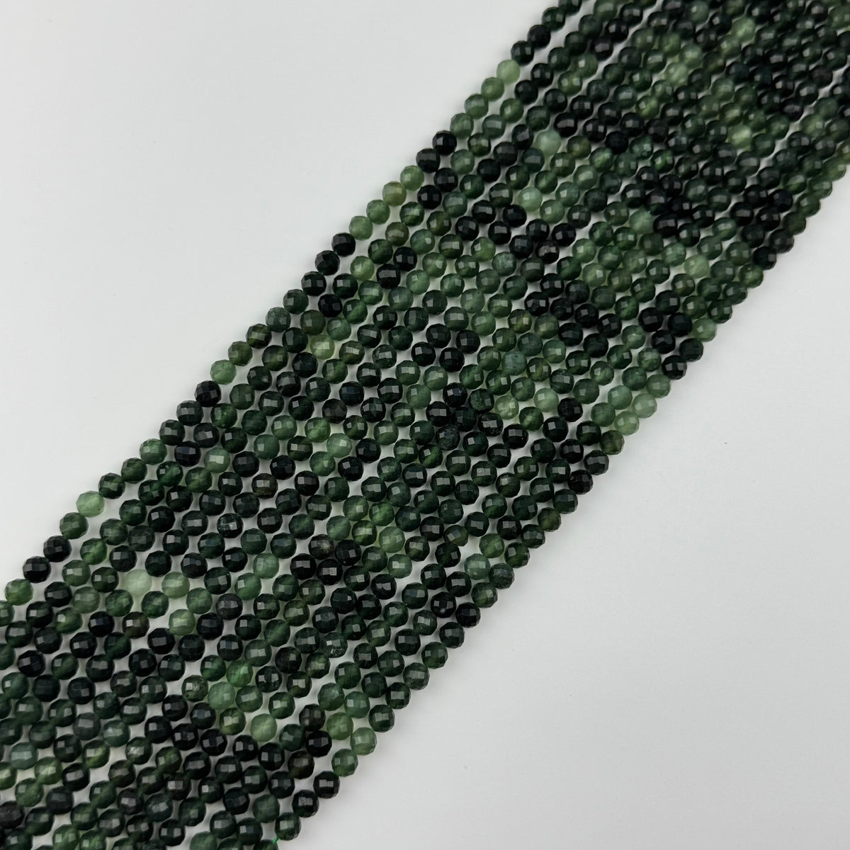 Serpentine Faceted Round Beads