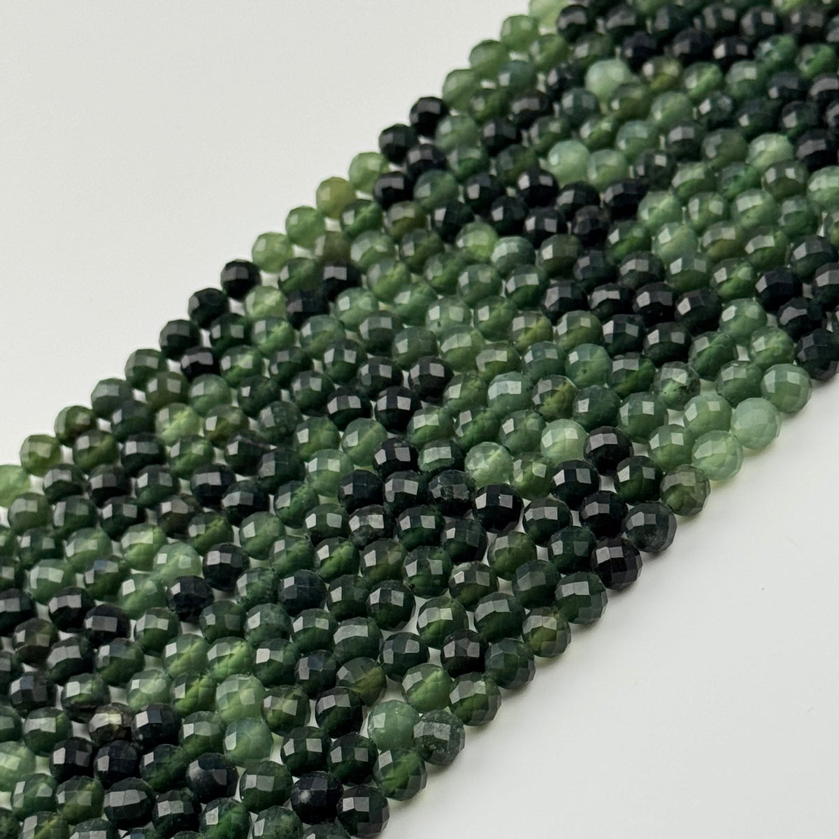 Serpentine Faceted Round Beads