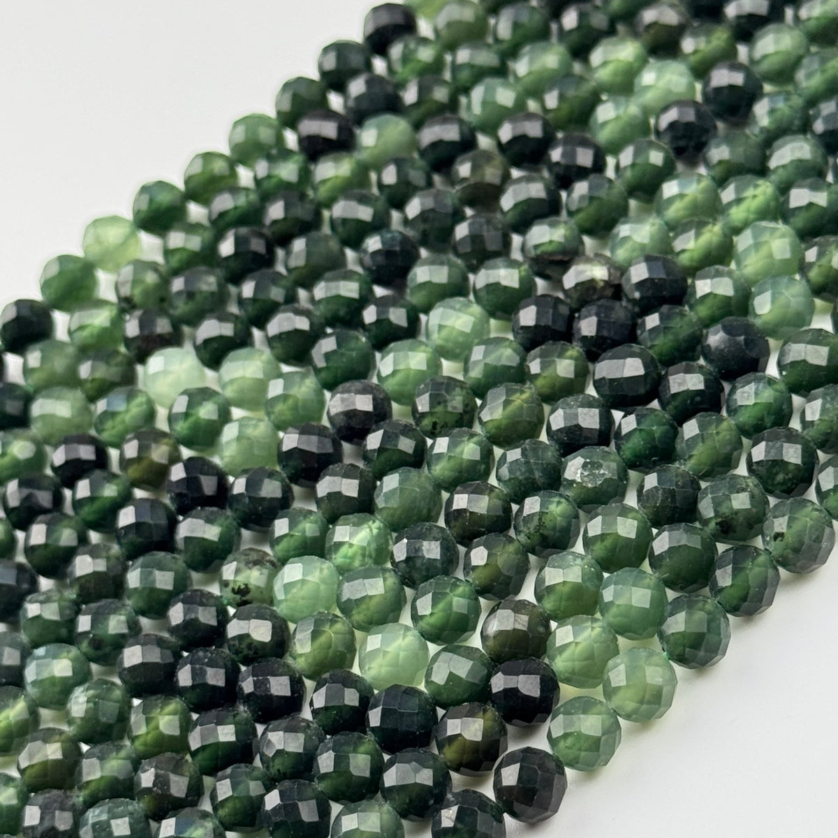 Serpentine Faceted Round Beads
