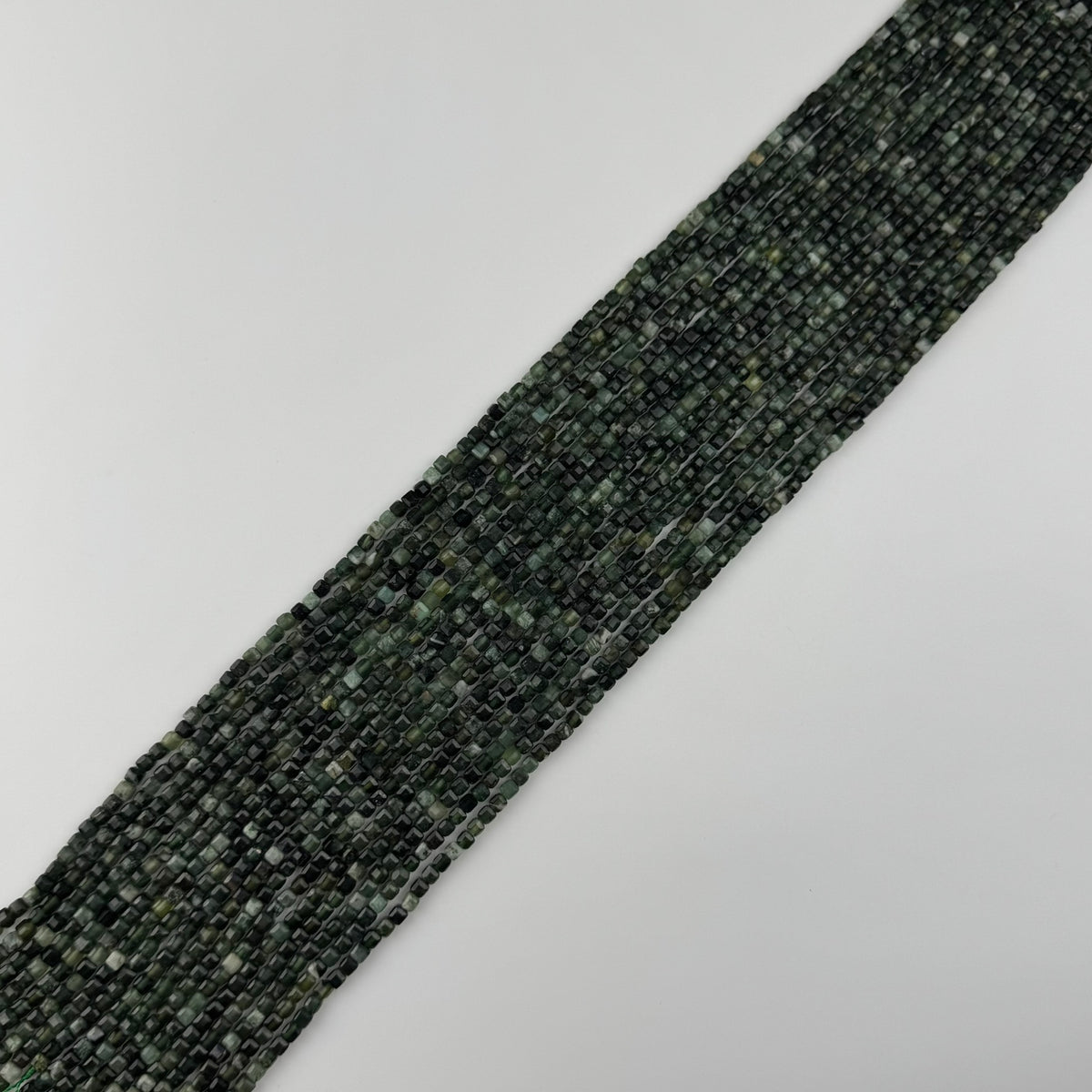 Serpentine Faceted Round Beads