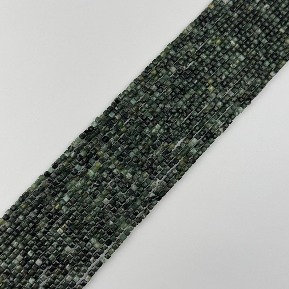 Serpentine Faceted Round Beads