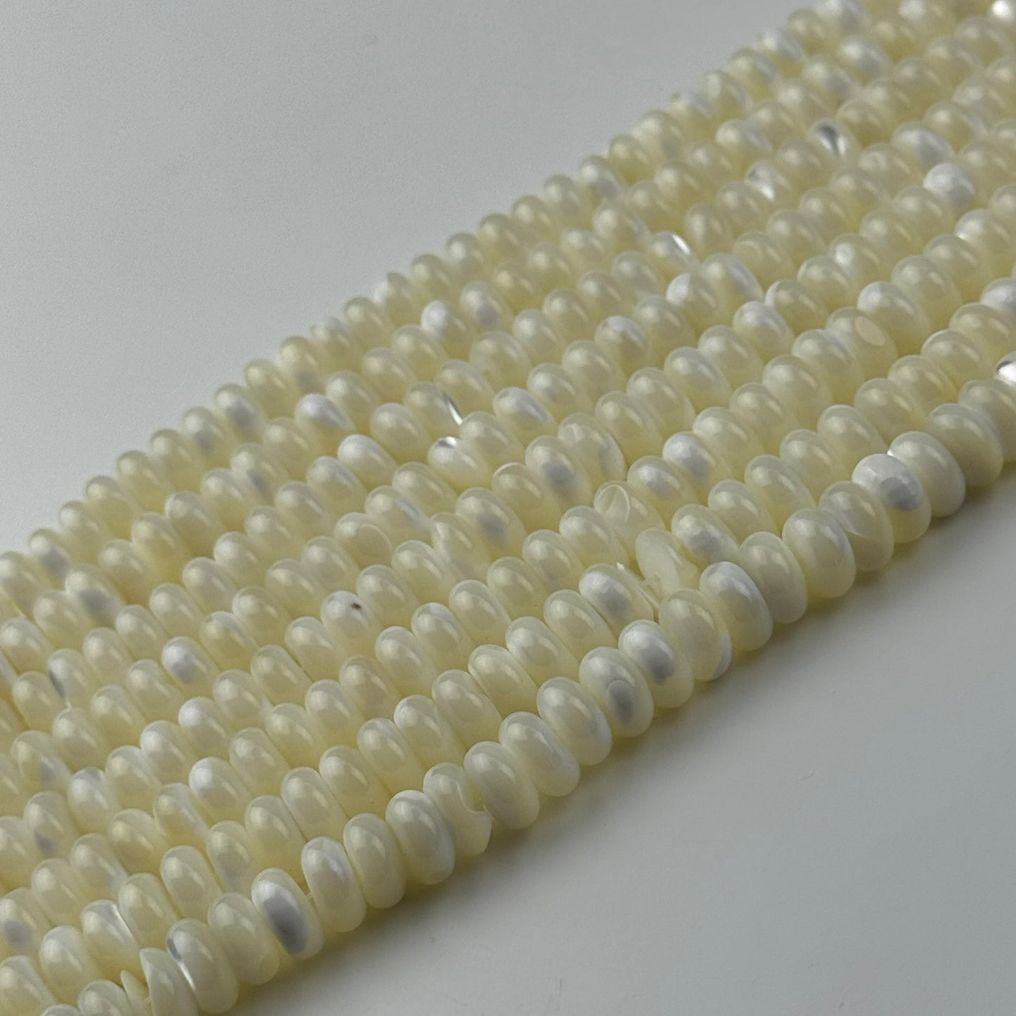 White Mother Of Pearl Polished Rondelle Beads