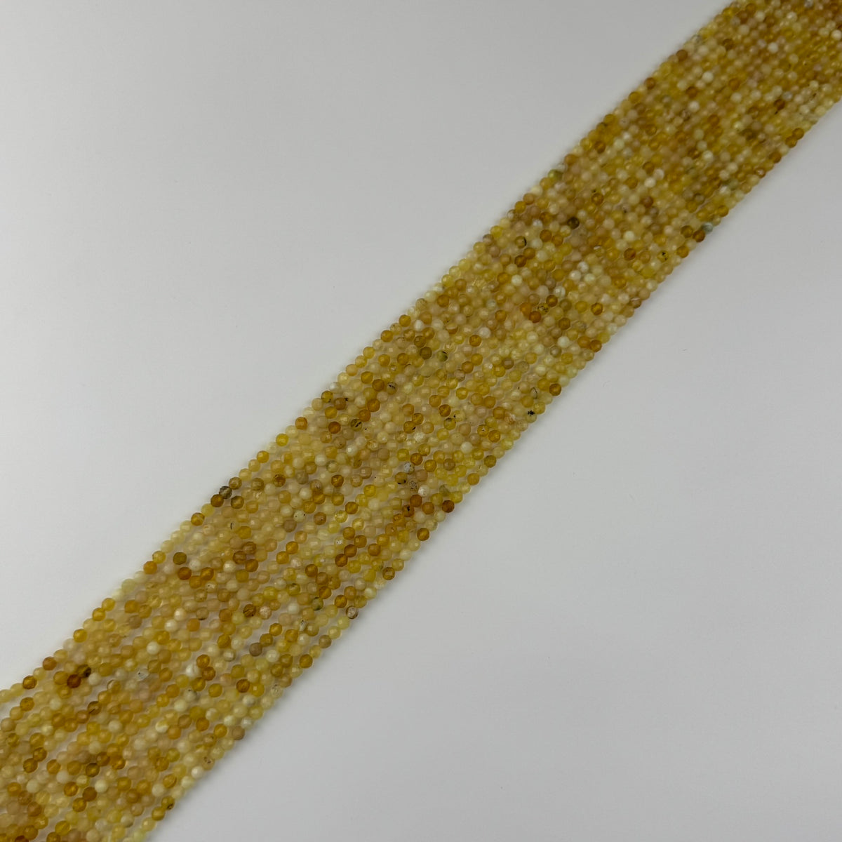 Yellow Opal Faceted Round Beads