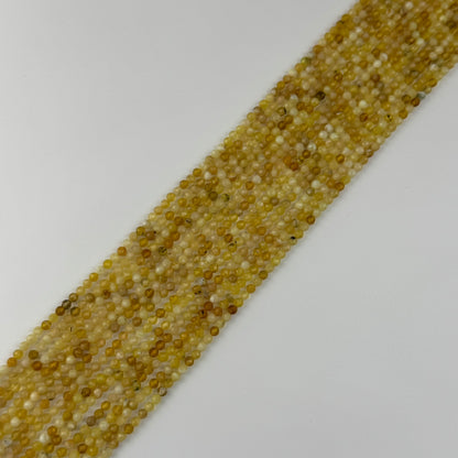 Yellow Opal Faceted Round Beads