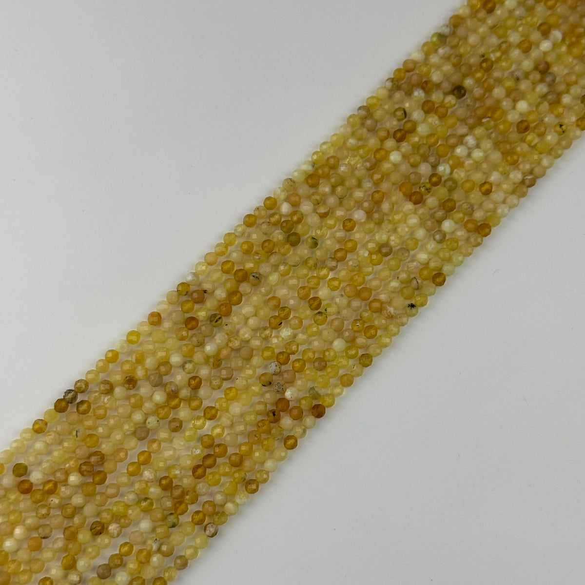 Yellow Opal Faceted Round Beads