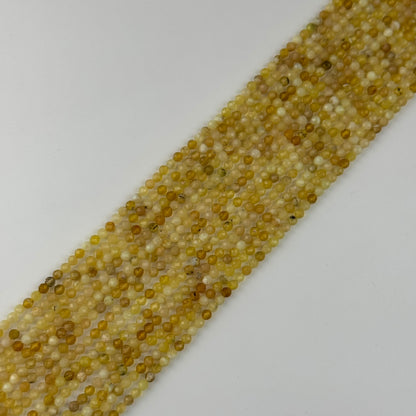 Yellow Opal Faceted Round Beads